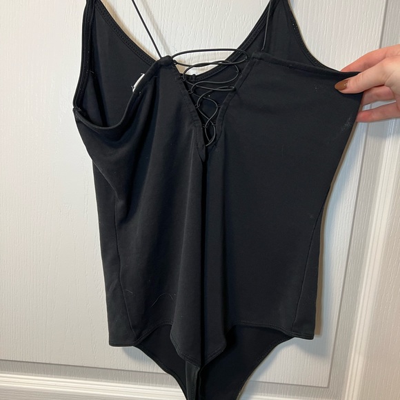 VINTAGE Garage Black Bungee Strap Laced Detail Back Thong Bodysuit - Picture 3 of 4
